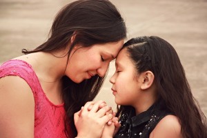 Mother and Daughter in Prayer Ministry Stock Photo